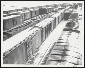 Empty, immobilized freight car stand in New Haven RR yards during Labor Strikes, R.R.