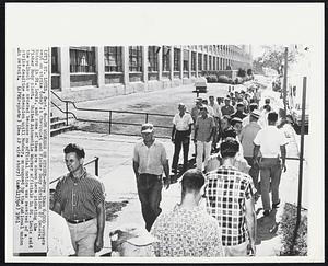 Chevrolet and Fisher Body Division of General Motors in St. Louis, and some of them are shown here picketing the Fisher Body plant. United Automobile Worker officials in St. Louis said the walkout was ordered because no official notice was received of a strike deadline extension until Monday, announced by the national union in Detroit.