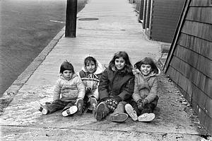 Sitting on the sidewalk