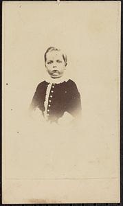 Portrait of child in buttoned shirt