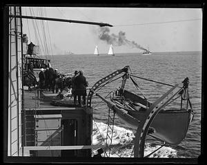 Spectators aboard ship watch races off Gloucester