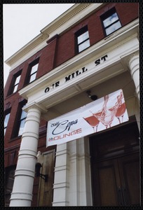 Exterior of One Mill St with a banner for Club Copa & Lounge