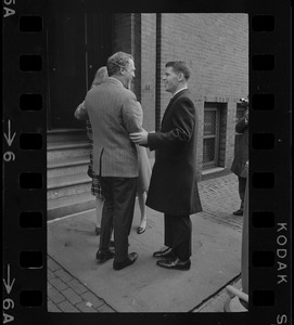 Boston Mayor-elect Kevin White speaking with an unidentified man the morning after the mayoral election