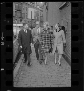 Boston Mayor-elect Kevin White and Kathryn White walking with an unidentified man and woman the morning after the mayoral election