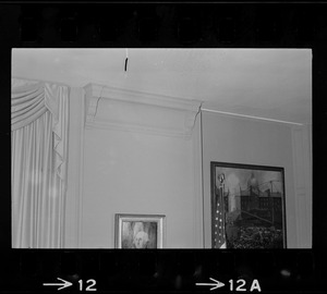Top of wall with two pictures on it