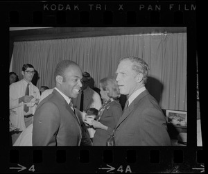 Unidentified man and Mayor Kevin White talking at Boston City Hospital