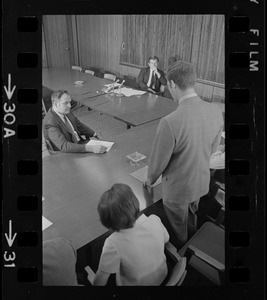 Unidentified man rises for a question during meeting between mayors and Sen. Kennedy