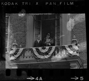 Unidentified uniformed man speaking from balcony of the Old State House
