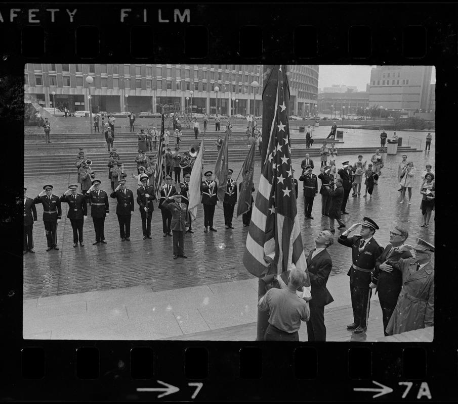 Mayor White raised Old Glory at City Hall to a near-empty plaza