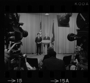 Television cameras and press equipment frame Mayor Kevin White and the candidate for Lieutenant Governor, Michael Dukakis, as they answer questions