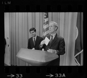 Pressing for a televised debate with Gov. Francis Sargent, Mayor Kevin White, backed by running-mate Michael Dukakis, says "I can't wait no longer" during conversation with newsmen