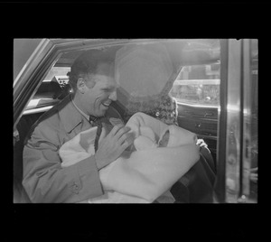 Home in time for Valentine's Day, Mayor Kevin White and wife, Kathryn, leave St. Margaret's Hospital with their newest daughter, born Feb. 5