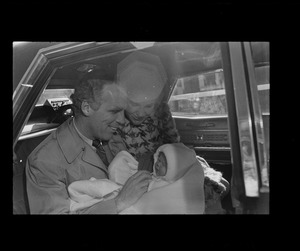 Home in time for Valentine's Day, Mayor Kevin White and wife, Kathryn, leave St. Margaret's Hospital with their newest daughter, born Feb. 5