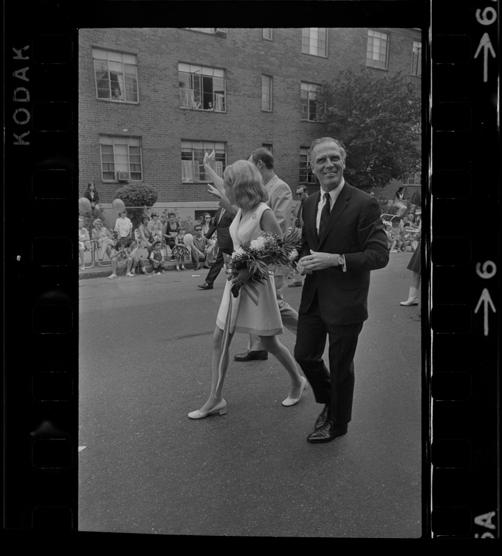 Boston Mayor Kevin White and Kathryn White walking in Bunker Hill Day parade