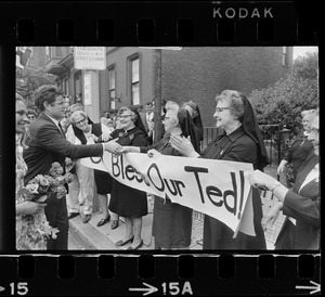 Sen. Ted Kennedy and Joan Kennedy greeting group of nuns during Bunker Hill Day parade