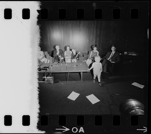 Mrs. Anthony W. England, Dr. and Mrs. Philip K. Chapman, Peter Chapman, Mrs. William B. Lenoir, Billy Lenoir, Jr., and Dr. William B. Lenoir at press conference at MIT