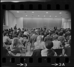 Audience in classroom for speech by Walt W. Rostow