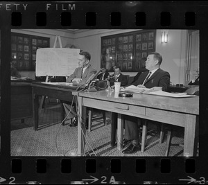 Unidentified man and Supt. Herbert F. Mulloney addressing Boston City Council Committee on Public Services about a series of murders