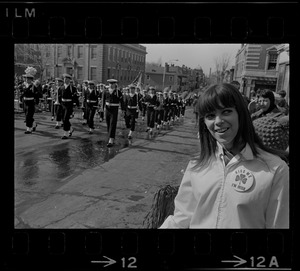 Spectators and Navy marching band at St. Patrick's Day parade