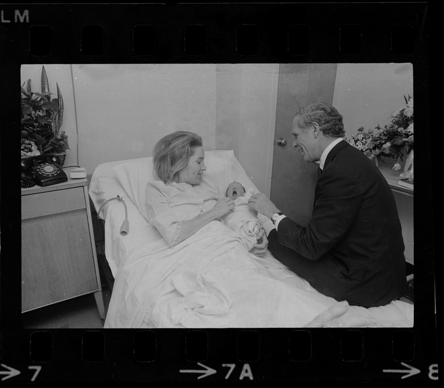 Mrs. Kathryn White introduces her baby girl to the Mayor at her bedside in St. Margaret's Hospital, Dorchester