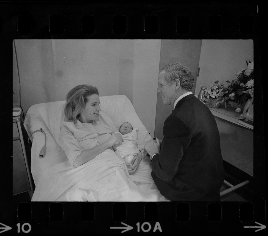 Mrs. Kathryn White introduces her baby girl to the Mayor at her bedside in St. Margaret's Hospital, Dorchester