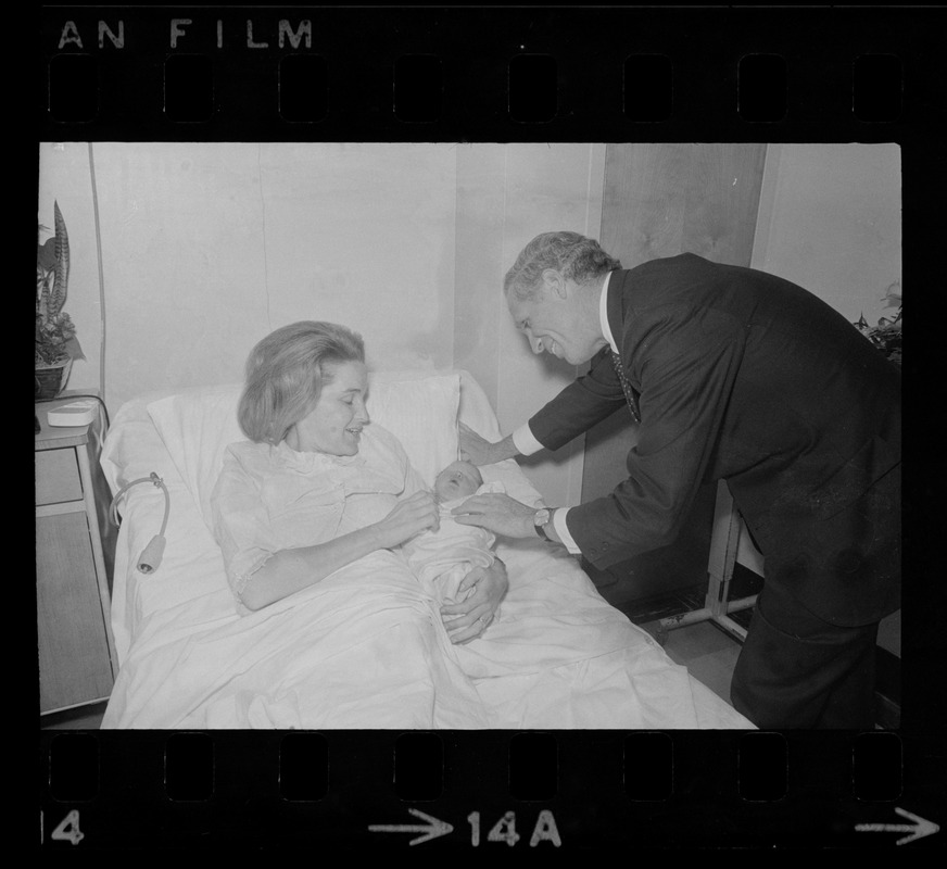 Mrs. Kathryn White introduces her baby girl to the Mayor at her bedside in St. Margaret's Hospital, Dorchester