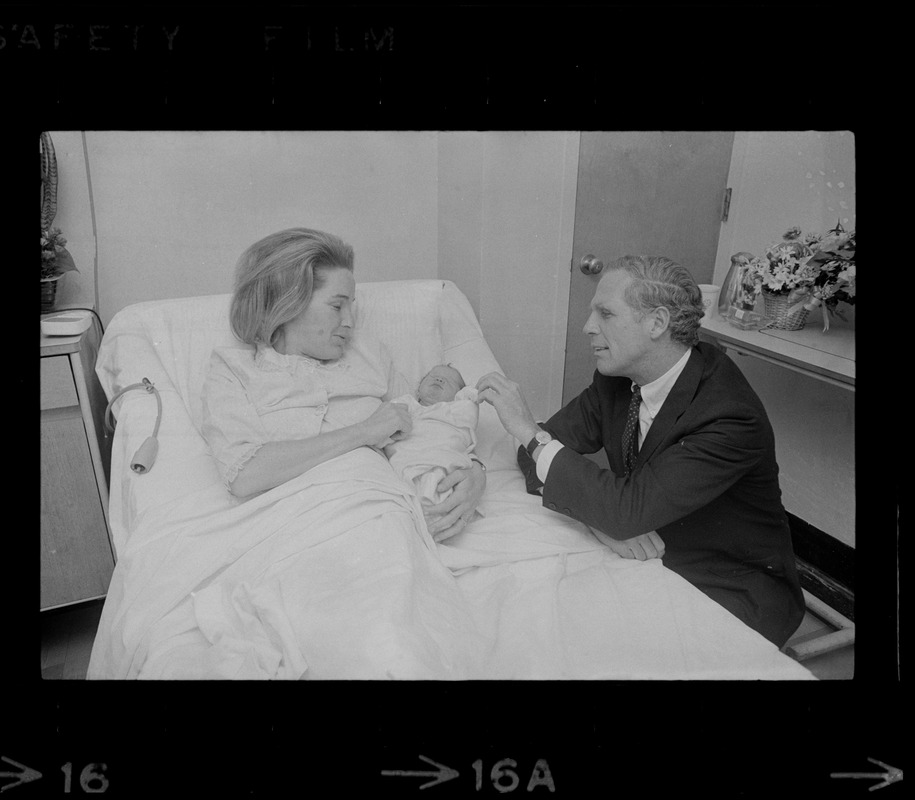 Mrs. Kathryn White introduces her baby girl to the Mayor at her bedside in St. Margaret's Hospital, Dorchester