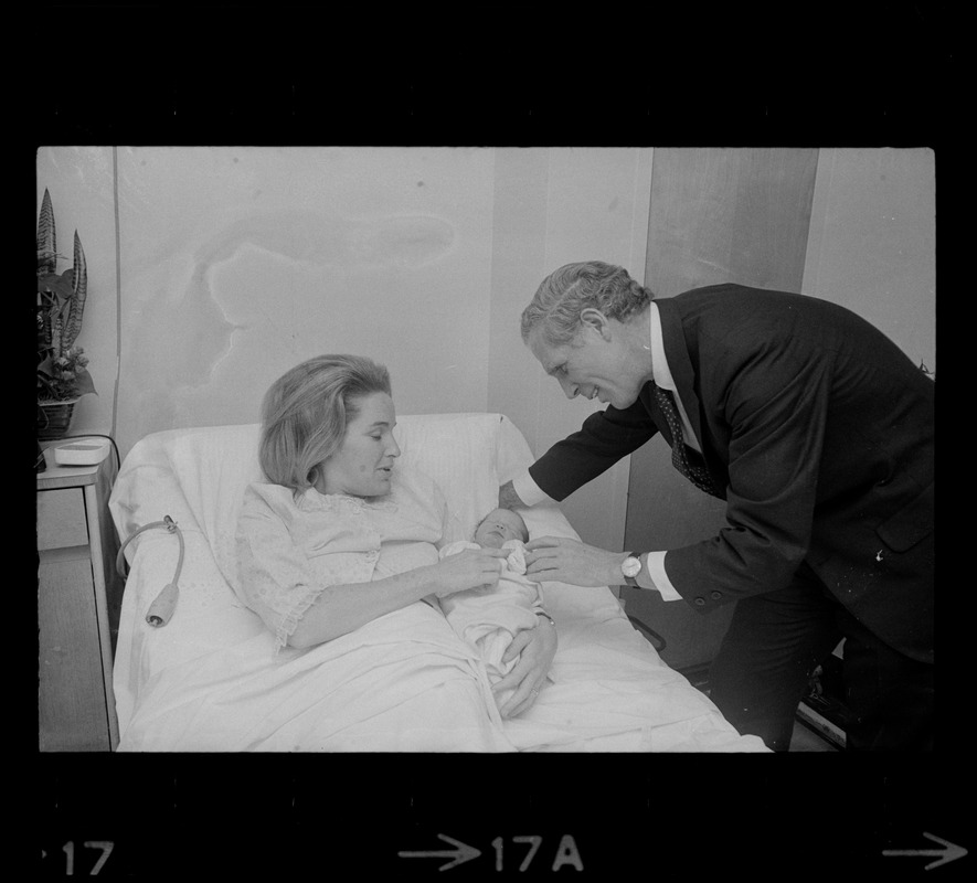 Mrs. Kathryn White introduces her baby girl to the Mayor at her bedside in St. Margaret's Hospital, Dorchester