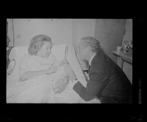 Mrs. Kathryn White introduces her baby girl to the Mayor at her bedside in St. Margaret's Hospital, Dorchester