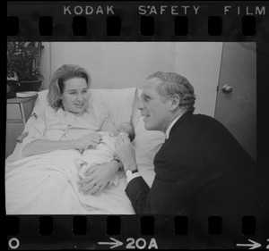 Mrs. Kathryn White introduces her baby girl to the Mayor at her bedside in St. Margaret's Hospital, Dorchester