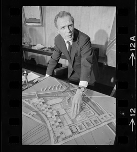 Boston Mayor Kevin H. White overlooks the scale model of proposed 129-acre high school to be constructed in the Madison Park area of lower Roxbury