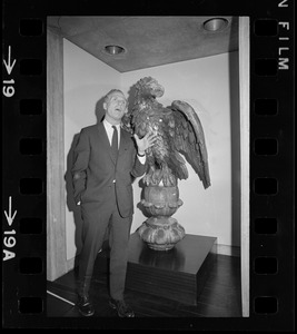 Mayor Kevin White and eagle statue in Boston City Hall's Eagle Room