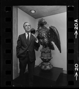 Mayor Kevin White and eagle statue in Boston City Hall's Eagle Room