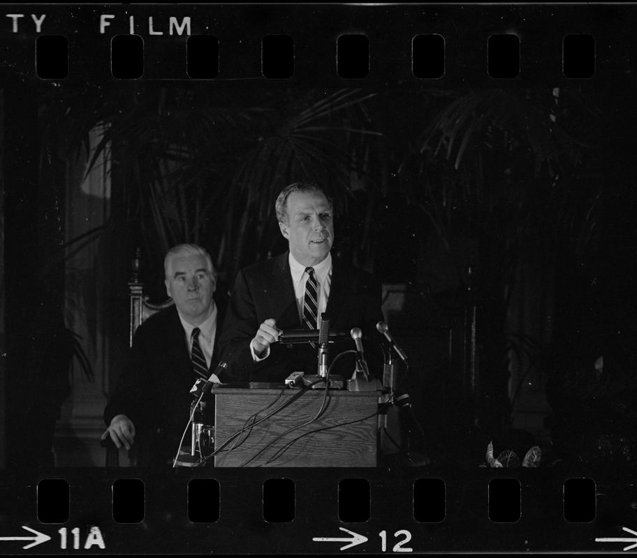 Boston Mayor Kevin White delivering State of the City address at Faneuil Hall as City Councilor John E. Kerrigan watches