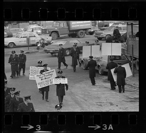 Boston firemen picketing outside of Faneuil Hall during State of the City address