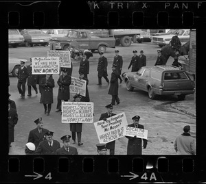 Boston firemen picketing outside of Faneuil Hall during State of the City address