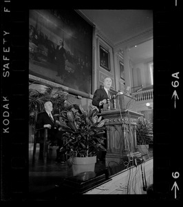 Boston Mayor Kevin White delivering State of the City address at Faneuil Hall as City Councilor John E. Kerrigan watches