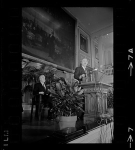 Boston Mayor Kevin White delivering State of the City address at Faneuil Hall as City Councilor John E. Kerrigan watches