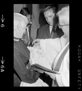 Godparents Richard Dray and Mrs. Lawrence Cameron, with godchild Patricia Hagan White at her christening in the home of Boston Mayor Kevin White