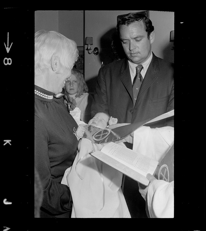 Godparents Richard Dray and Mrs. Lawrence Cameron, with godchild Patricia Hagan White at her christening in the home of Boston Mayor Kevin White