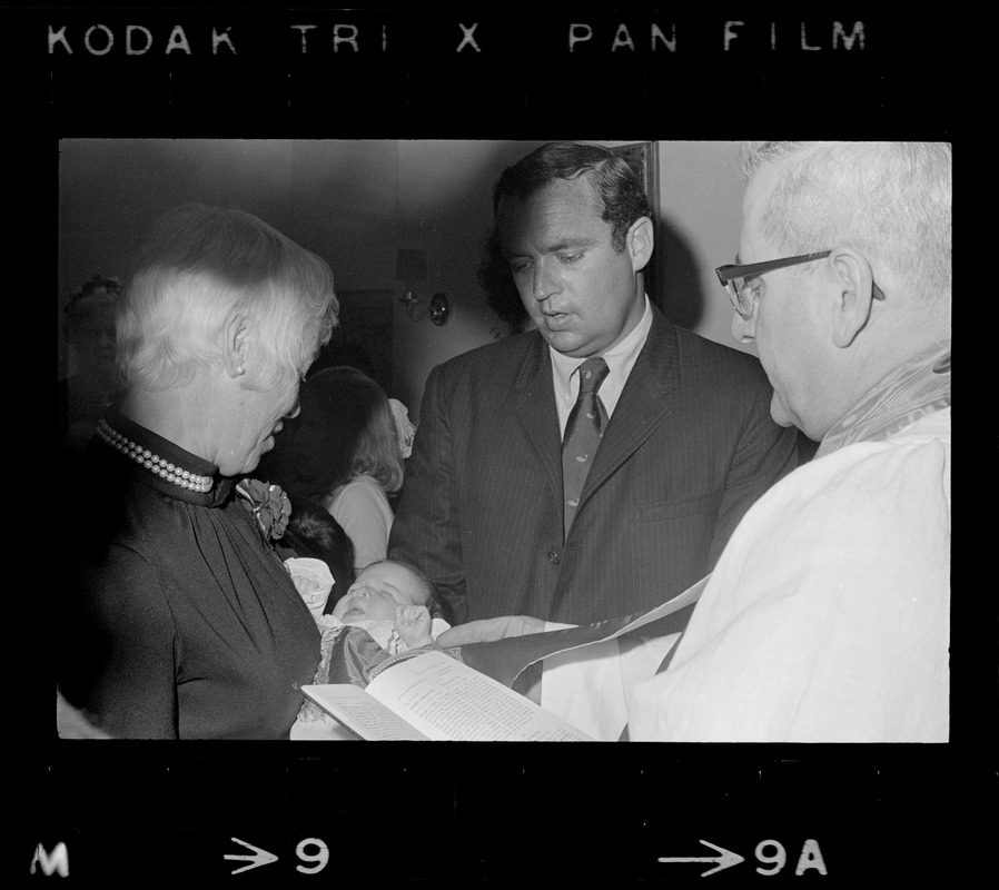 Godparents Richard Dray and Mrs. Lawrence Cameron, with godchild Patricia Hagan White at her christening in the home of Boston Mayor Kevin White