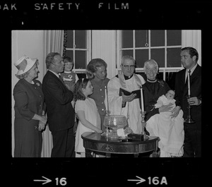 Mayor Kevin White's new daughter, Patricia Hagan White, is held by godmother, Mrs. Lawrence Cameron of Hyde Park, during christening last night. Celebrated in the Mayor's Beacon Hill residence, at the rites were: (from left) Mrs. Patricia White, mother of the Boston Mayor, Mayor White, Christopher, 3, Mrs. Kathryn White, Catlin, 10, Rev. Gerald Bucke, St. Joseph's Church, West End, and godfather, Richard Dray of Milton