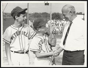 Shaking Hands with the Commissioner- Pittsfield Little Leaguers Dave DiNicola (left) and Bill Mele shake hands with M.D.C. Commissioner Howard Whitmore, Jr. at State Little League playoffs yesterday.