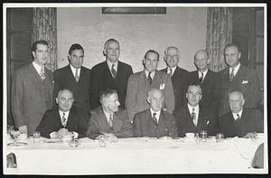 Chief Executives of 11 Cities at a luncheon of the Mayors' Club of Massachusetts at the Parker House yesterday. Left to right: Seated - Mayors Walter E. Lawrence, Medford, Arthur Harriman, New Bedford, Alexander C. Murray, Fall River, and John E. Kerrigan, Boston, Lawrence B. Flint of Milton, club secretary. Standing, Mayors G. Edward Bradley, Somerville, Paul M. Goddard, Newton, J. F. Devane, Waltham, John M. Kelleher, Newburyport, Weston U. Friend, Gloucester, Mathias LaPierre, Leominster, and Merrill D. Aldrich, Taunton.