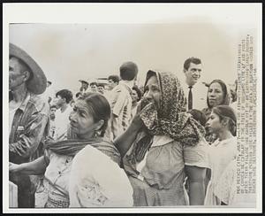 Mexico City -- Lime For Aid -- Frightened inhabitants of Coyuca de Catalan in the state of Guerrero line at aid posts after their village was hardly hit by an earthquake early monday. Thirtyone persons were killed in the area as numerous houses and shacks were destroyed.