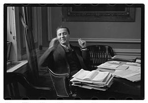 A man seated at a desk