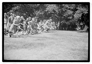 Girls rolling hoops