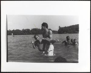 Dunking a girl in the water