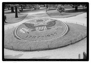 "1787-1937" floral design of the Great Seal of the United States in front of Ether Monument, Public Garden