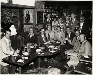 Unidentified group raising glasses, possibly after the groundbreaking ceremony for Boston Public Library's Johnson building